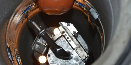 The new reactive resin Konudur Robopox 10 fast in use with robot technology in a non-accessible sewer. <br>&copy; MC-Bauchemie 2026